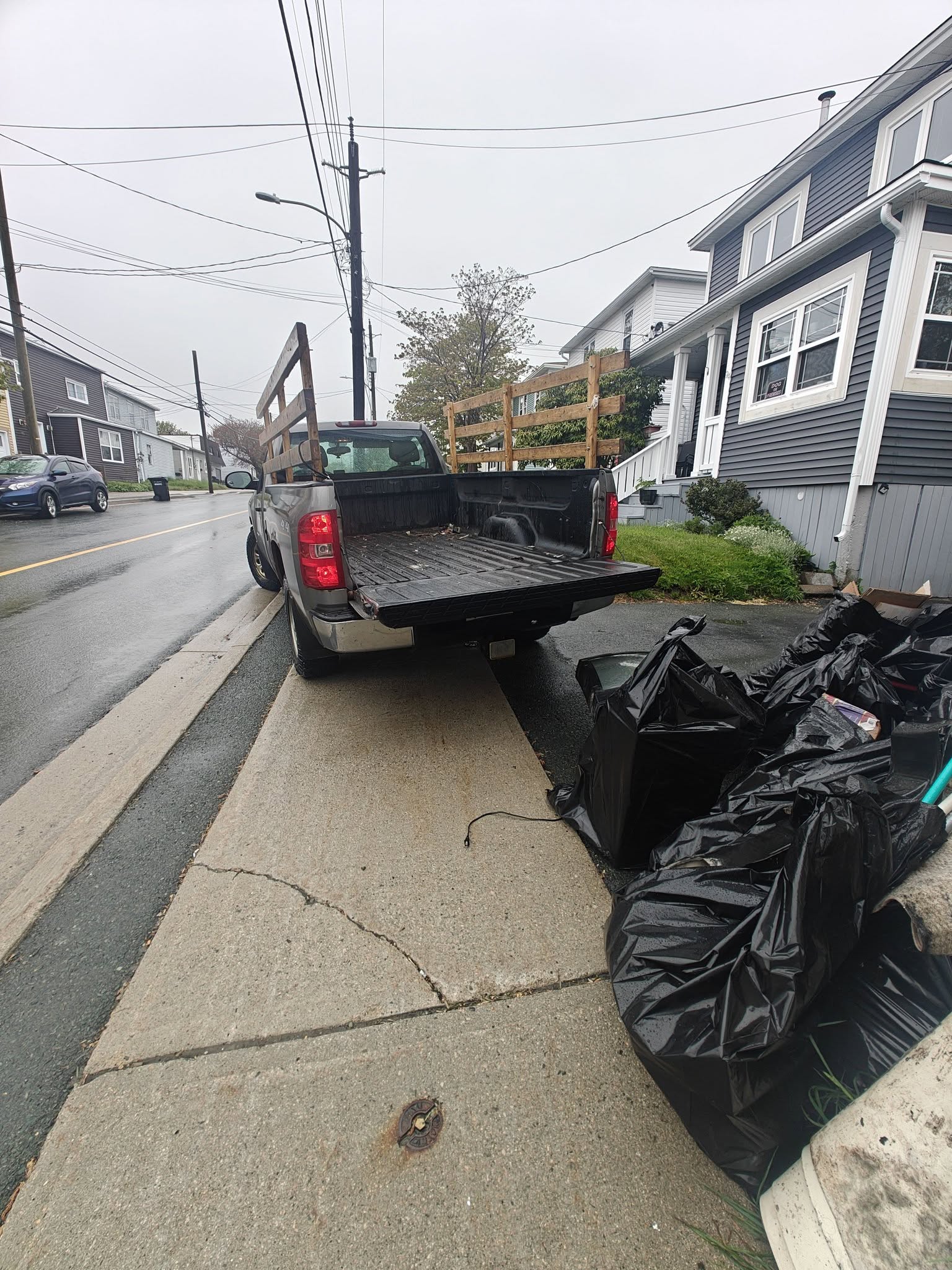 FareShare local junk removal truck ready for same-day pickup in Avalon Peninsula